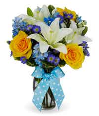 Orange roses, white lilies and blue filler flowers