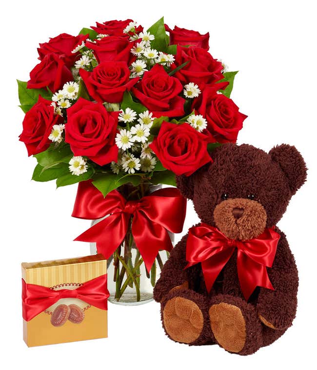 One Dozen red roses with a teddy bear and chocolates