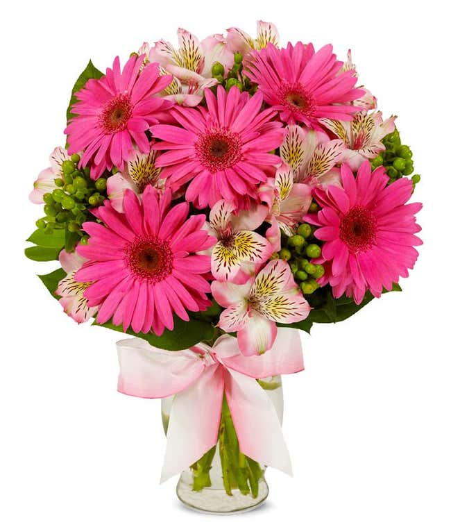 Pink gerbera daisies with pink alstroemeria and hypericum berries bouquet