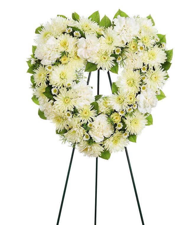 Heart shaped white flower funeral standing spray