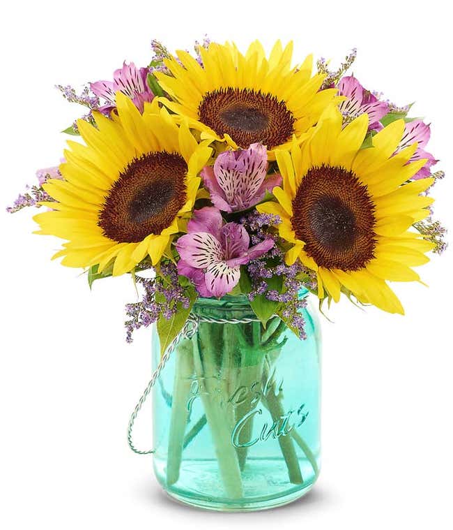 Sunflowers in mason jar vase