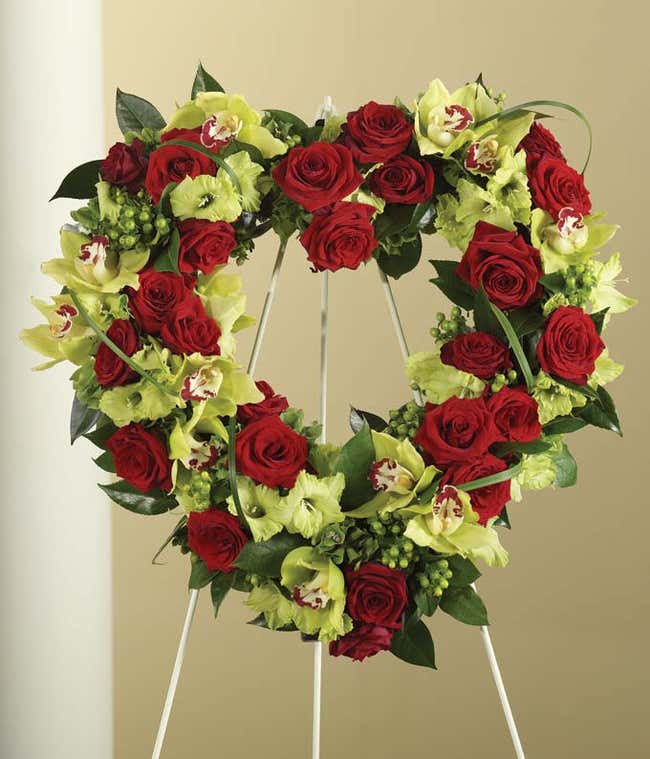 Red roses, green orchids and Green Gladiolus in a  Heart Standing Wreath