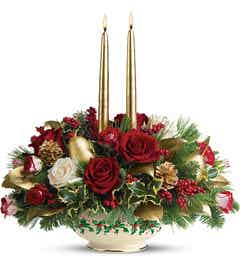 Winter flower centerpiece with gold candles